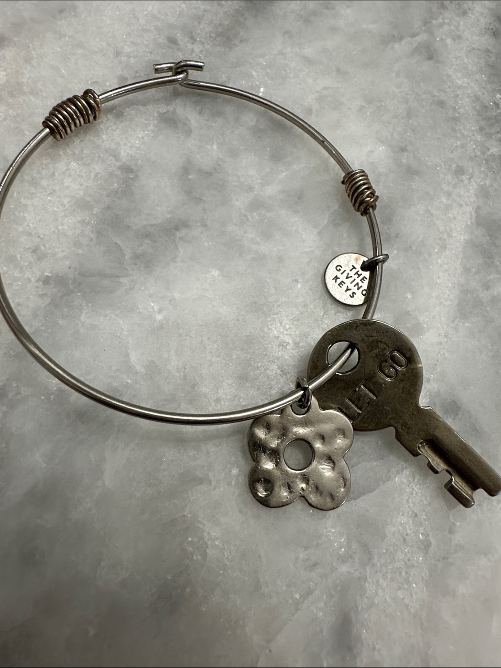 The Giving Keys Silver-Tone Flower & Key Charm Bangle “Let Go”